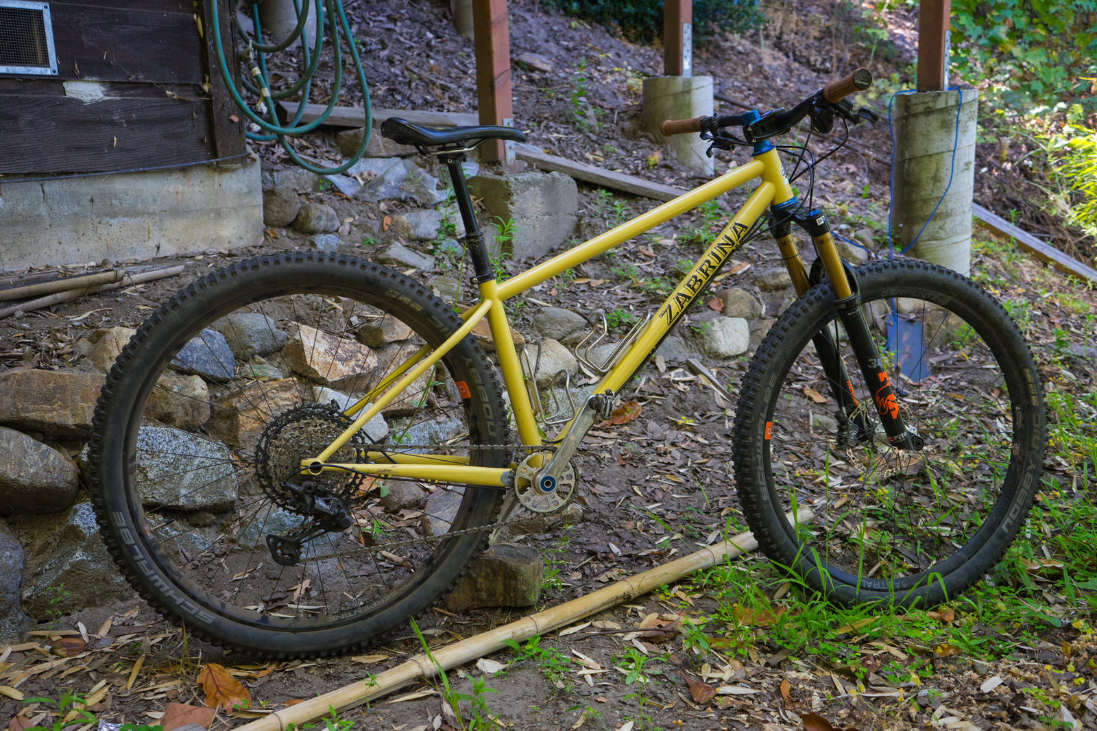 Yellow Zabrina hardtail mountain bike with a gold suspension fork