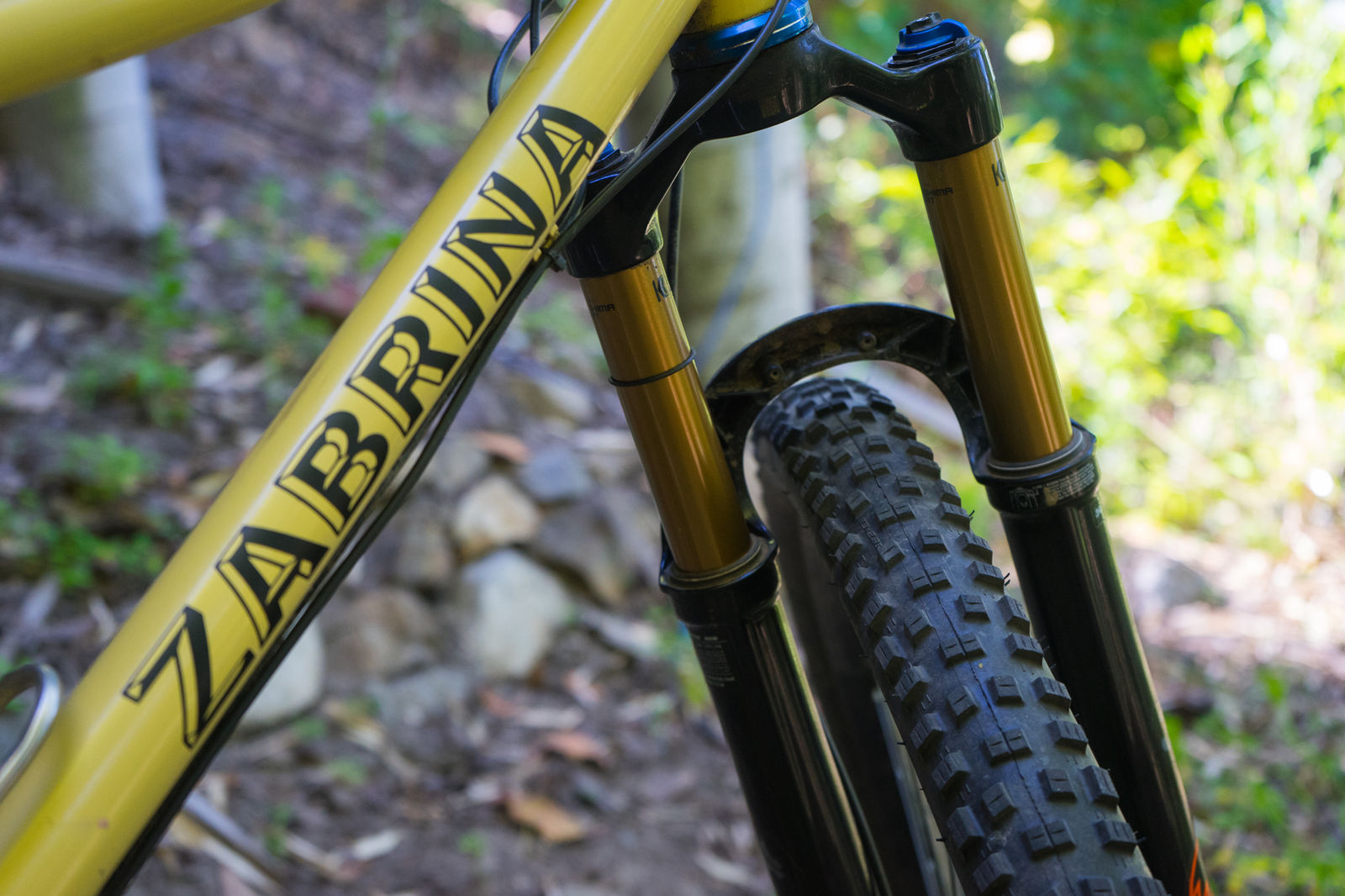 Zabrina lettering on a yellow down tube next to the fork
